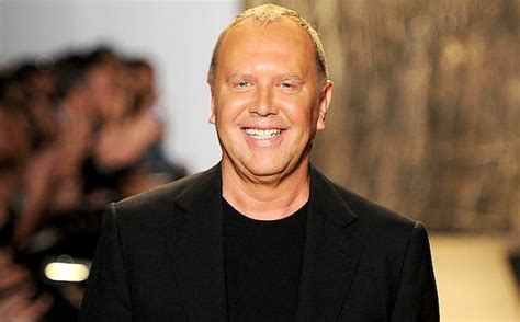 michael kors accomplishments|More.